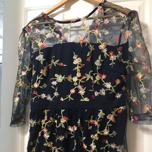 Wedding guest dress with embroidered floral detail